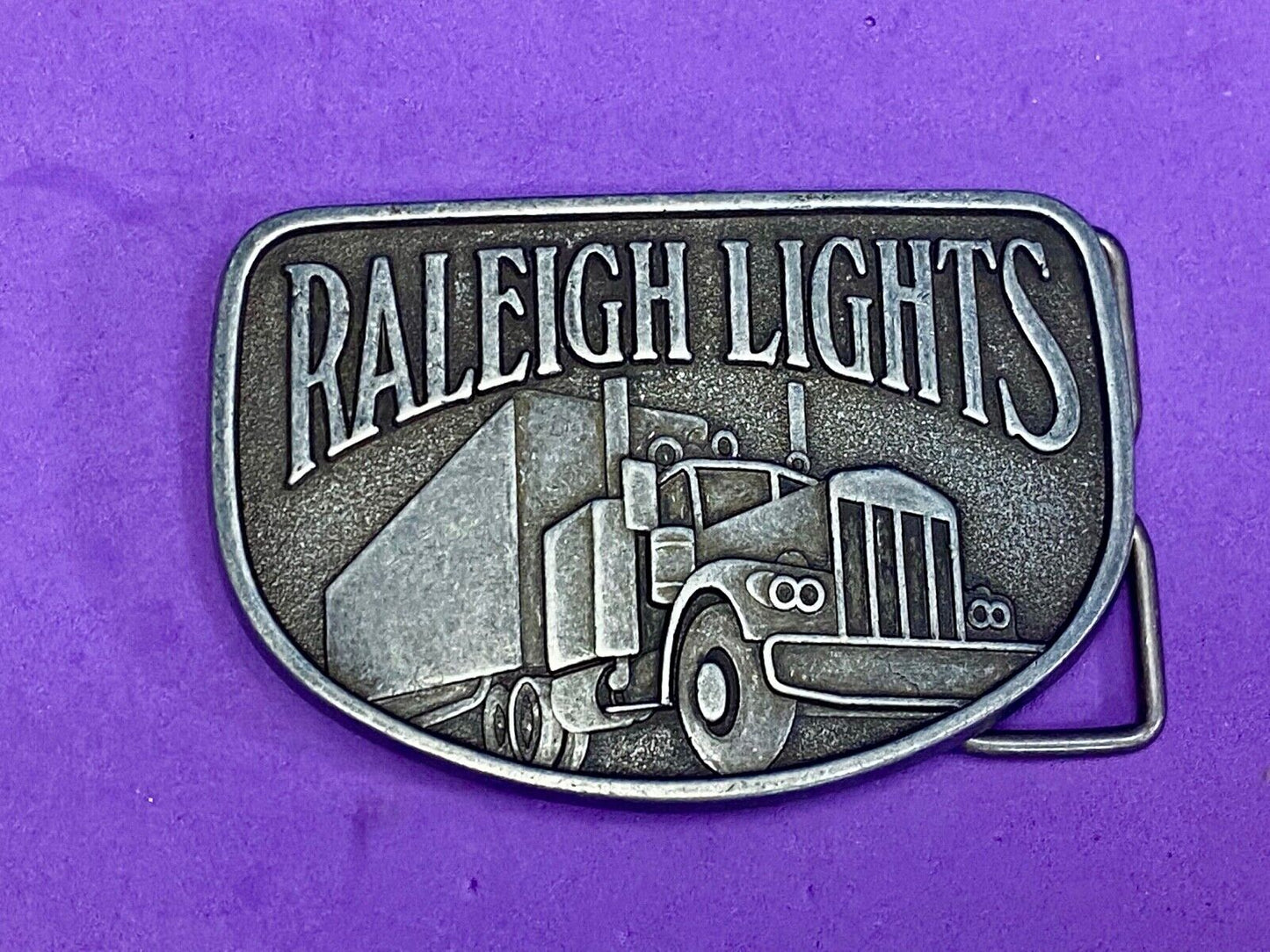 Vintage Belt Buckle Raleigh Lights Cigarette Trucker Trucking Cigarettes