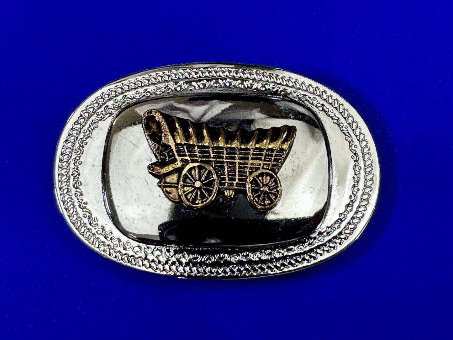 Vintage Covered Wagon - western two tone outlined belt buckle