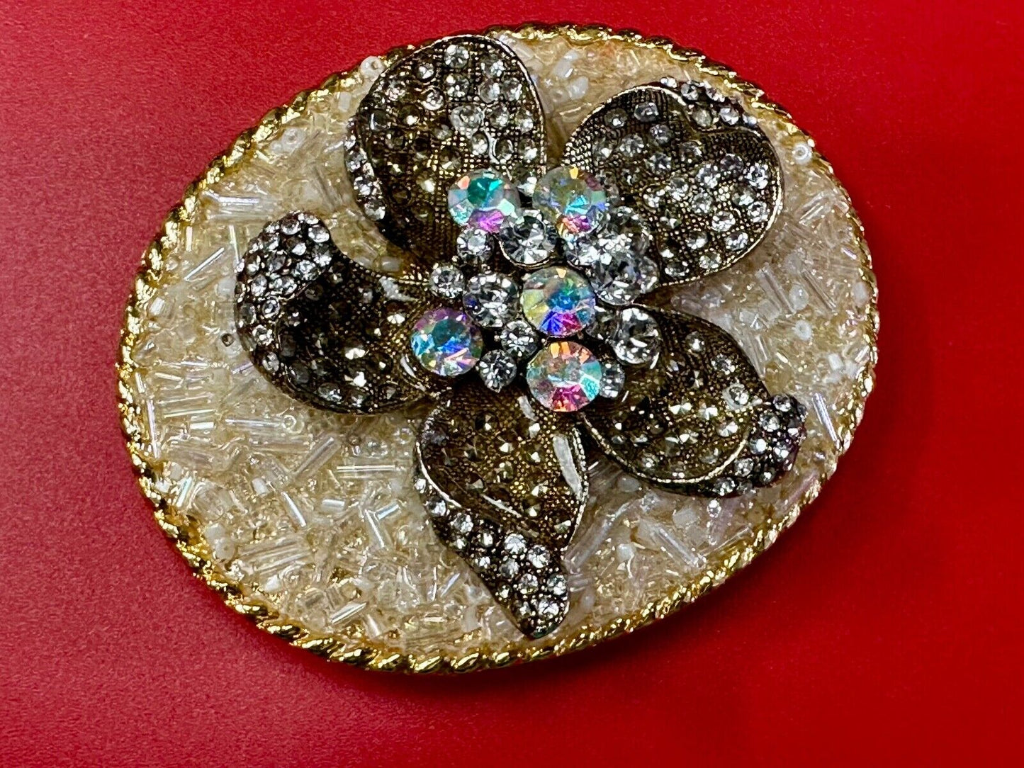 Beautiful chunky goldtone flower centerpiece in rhinestone accented belt buckle