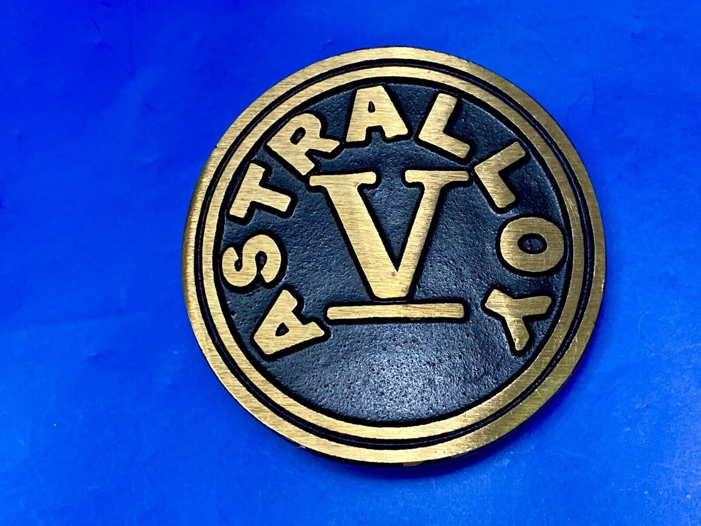 Astralloy Vis a unique, deep-air hardened steel promotional brass belt buckle