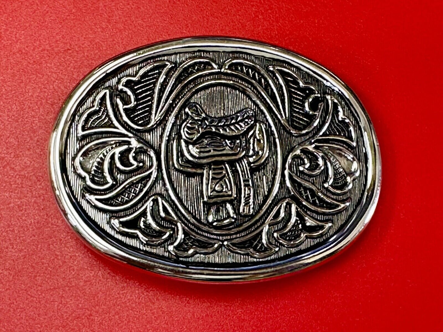 Vintage Cowboy's Horse Saddle ornate flower swirl oval belt buckle by Avon