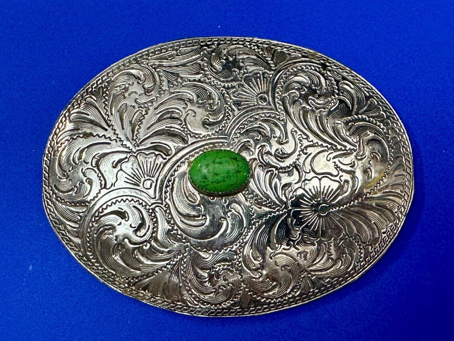 Artisan Made vtg Large western flower swirl design belt buckle green center Cab