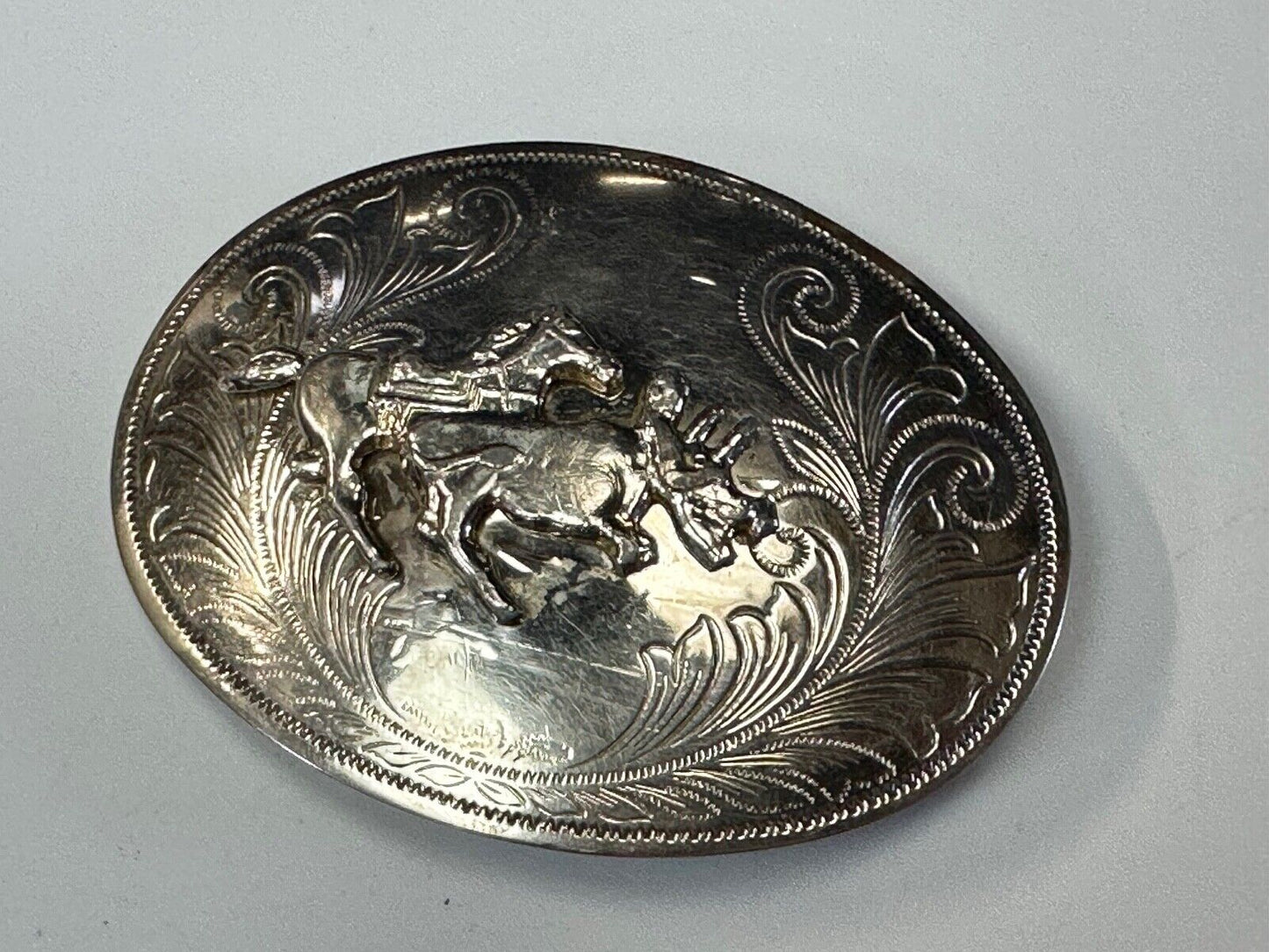 Vintage Cowboy Saddle Bronc western silver tone belt buckle