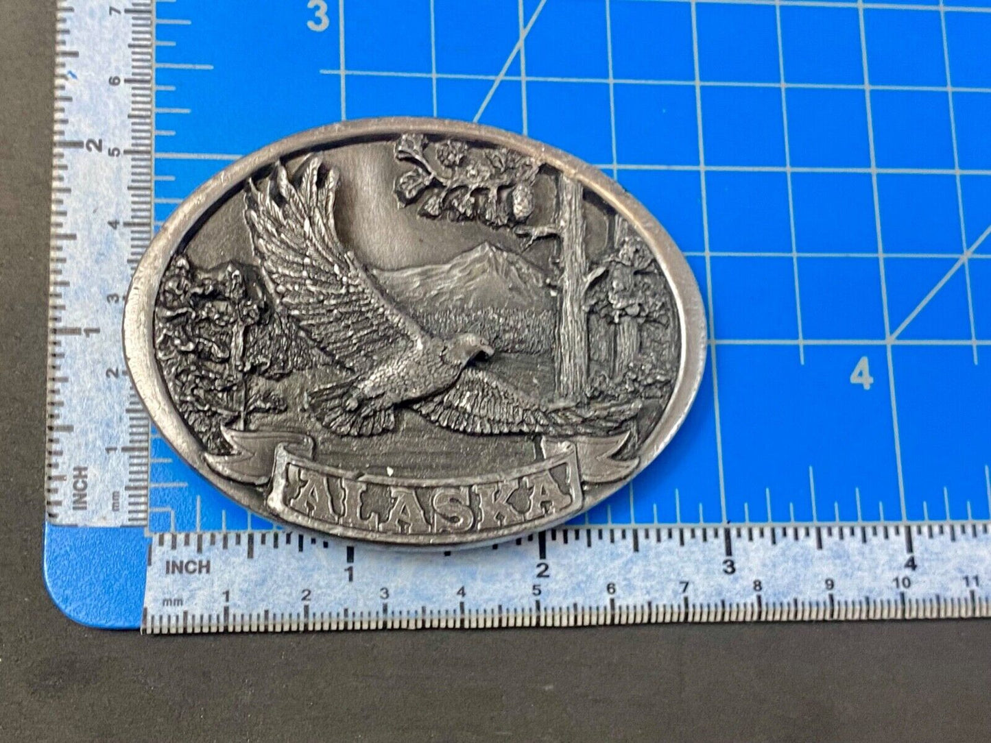 Vintage 1986 Eagle flying high over mountains Alaska belt buckle by C+-J