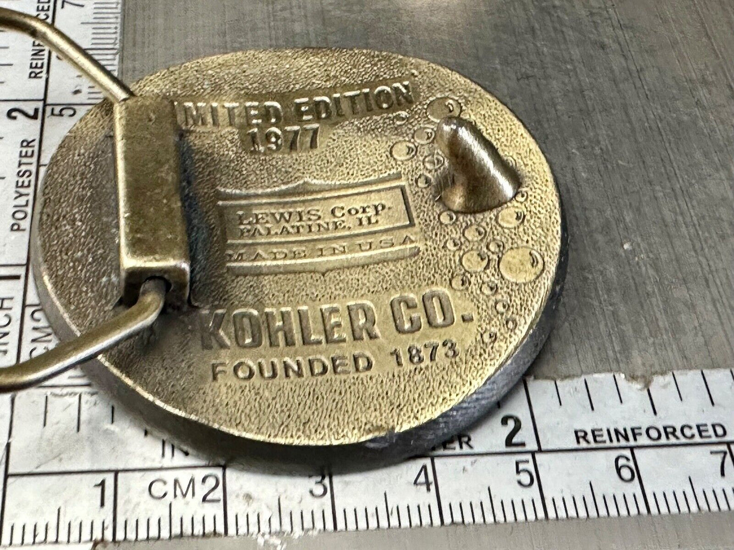 The Bold Look of Kohler - Vintage 1977 Lewis round Limited Edition belt buckle