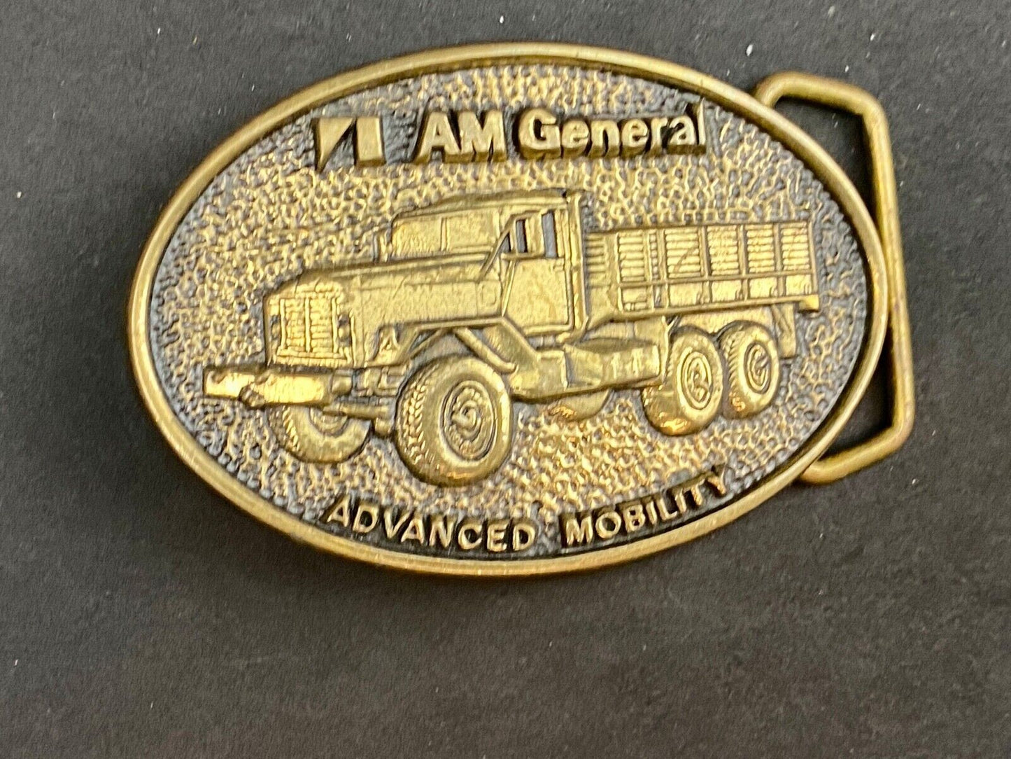 AM General Advanced Mobility belt buckle 2nd in a collector series 5 Ton Trucks