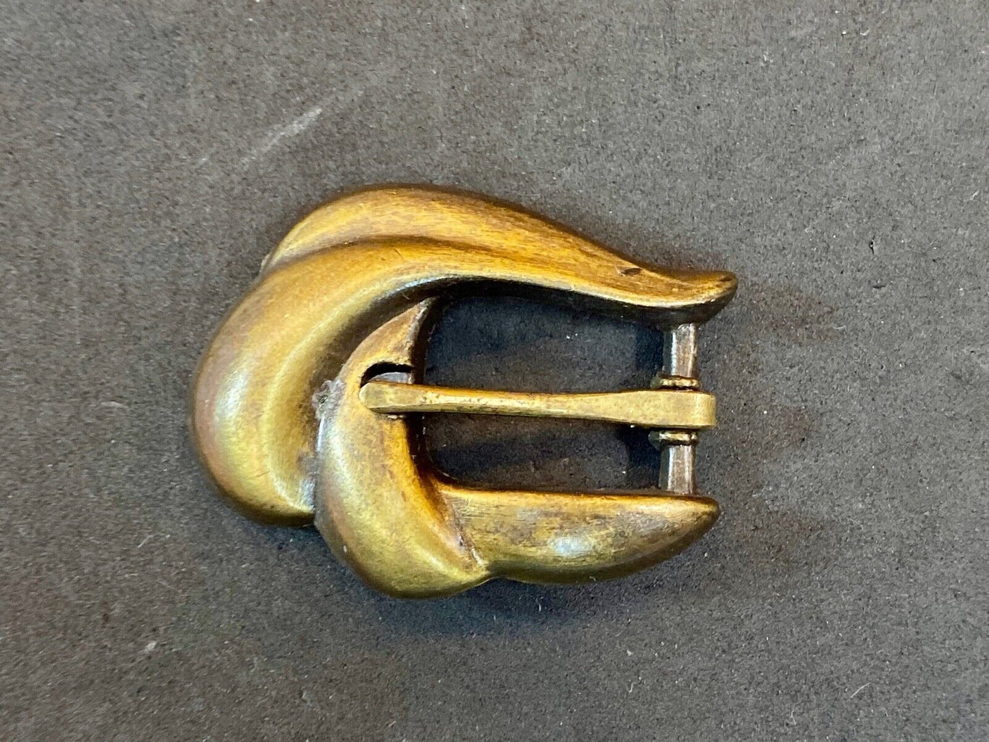 apple acc of New York stamped gold tone retro belt buckle