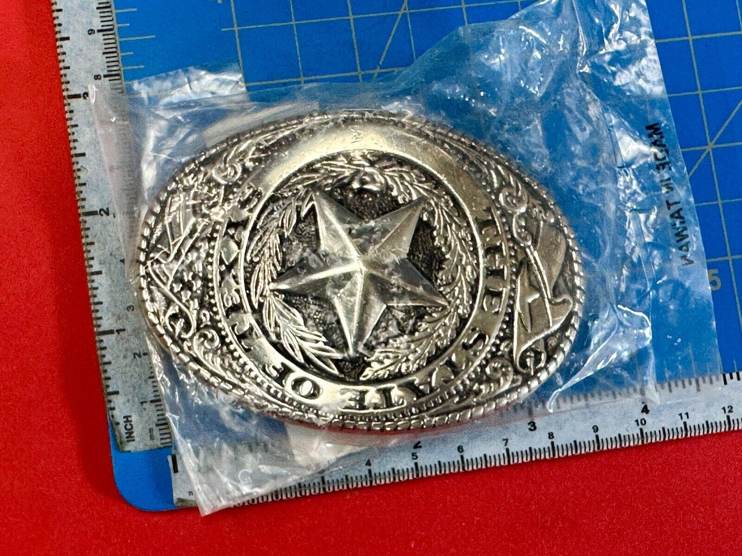 The Great State of Texas - Lone Star Flags seal silver tone NOS belt buckle