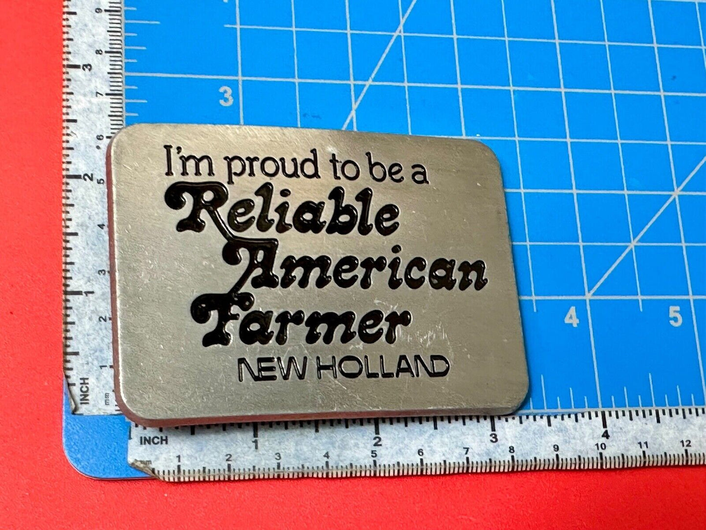 Vintage 1982 NEW HOLLAND I'm Proud to be a Reliable American Farmer Belt Buckle