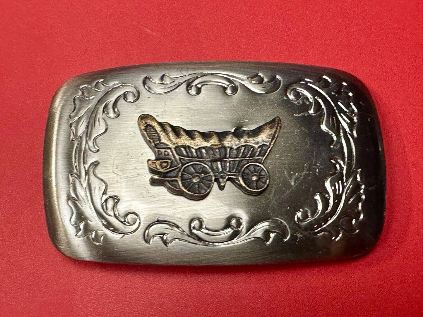 Vintage covered wagon two tone western mixed metal belt buckle