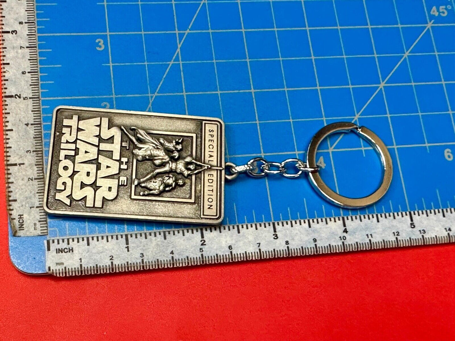 The Star Wars Trilogy Logo Emblem NOS Keychain!
