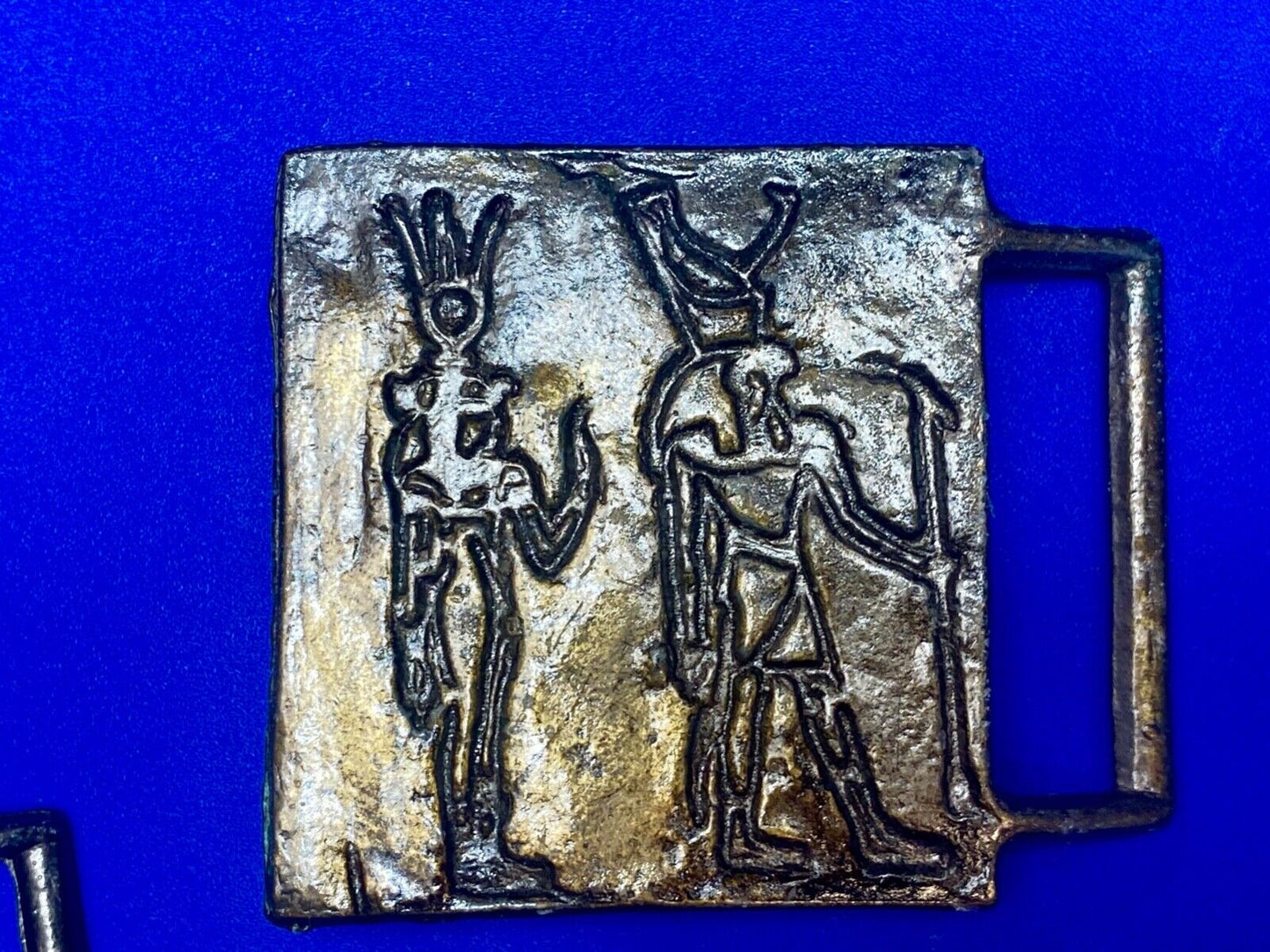 Two Tribal Warriors Indian figures? accoral marked numbered belt buckle