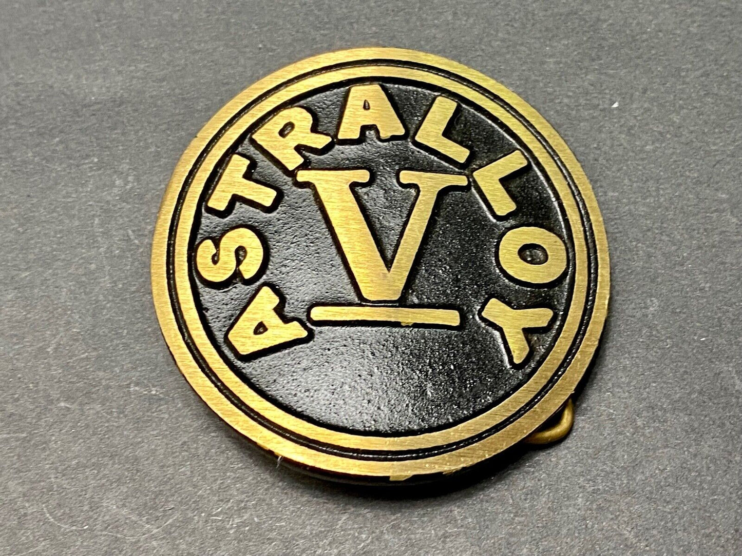 Astralloy Vis a unique, deep-air hardened steel promotional brass belt buckle