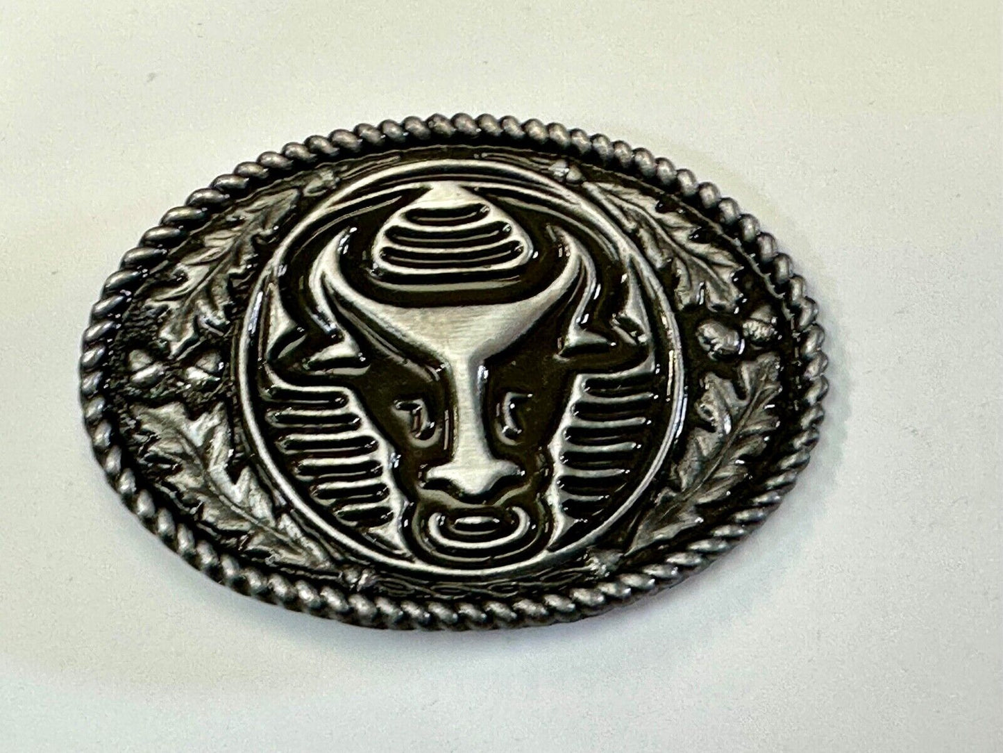 The Longhorn cow steer with nose ring Vintage rope boarder belt buckle