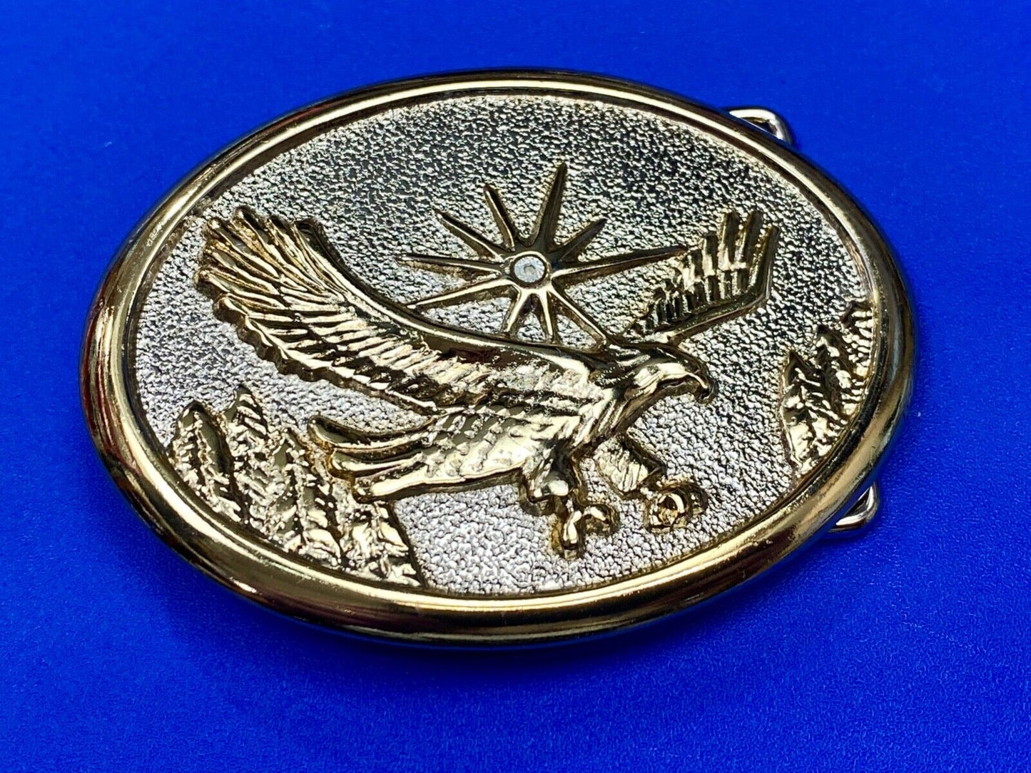 Vintage Eagle Flying Over Mountains W/ Sunburst two tone oval belt buckle