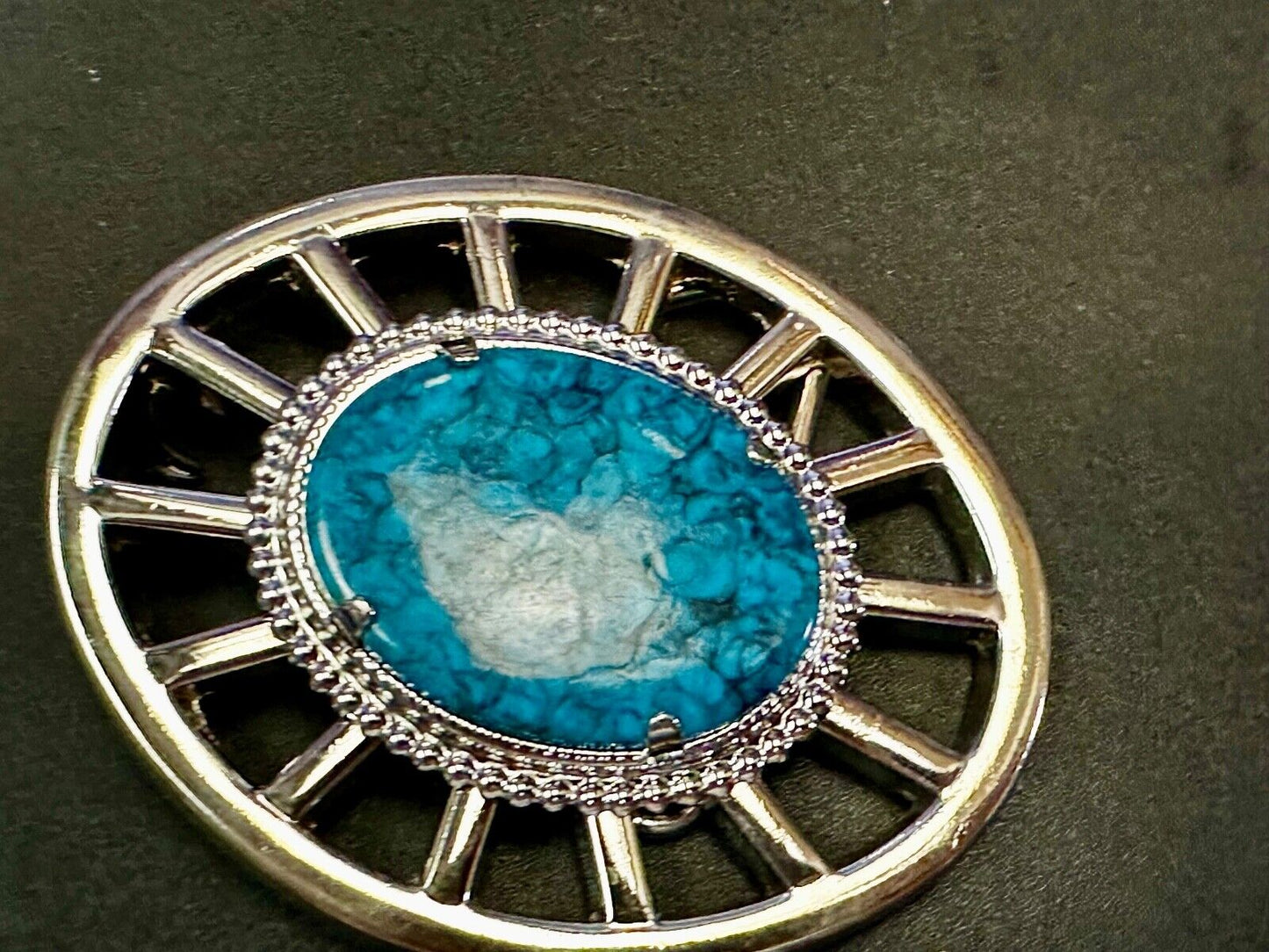 Synthetic Turquoise in unique see through silver tone round Belt Buckle