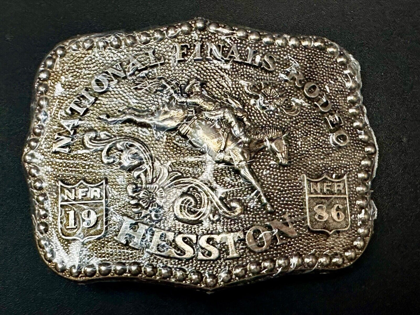 1986 ADULT SIZE NATIONAL FINALS RODEO HESSTION NFR NOS Cowboys Belt Buckle