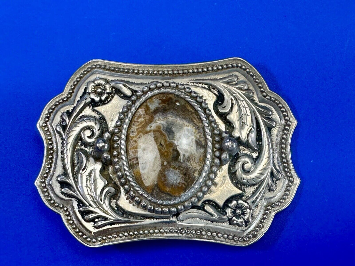 Vintage cabochon cab stone centerpiece on western silver tone belt buckle