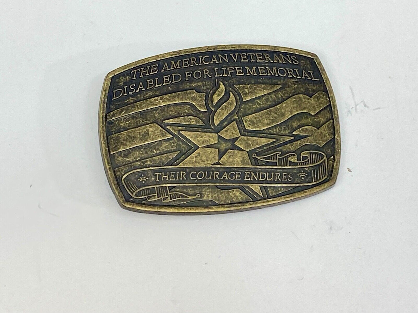 The American Disable Veteran Memorial Belt Buckle Their Courage Endures.