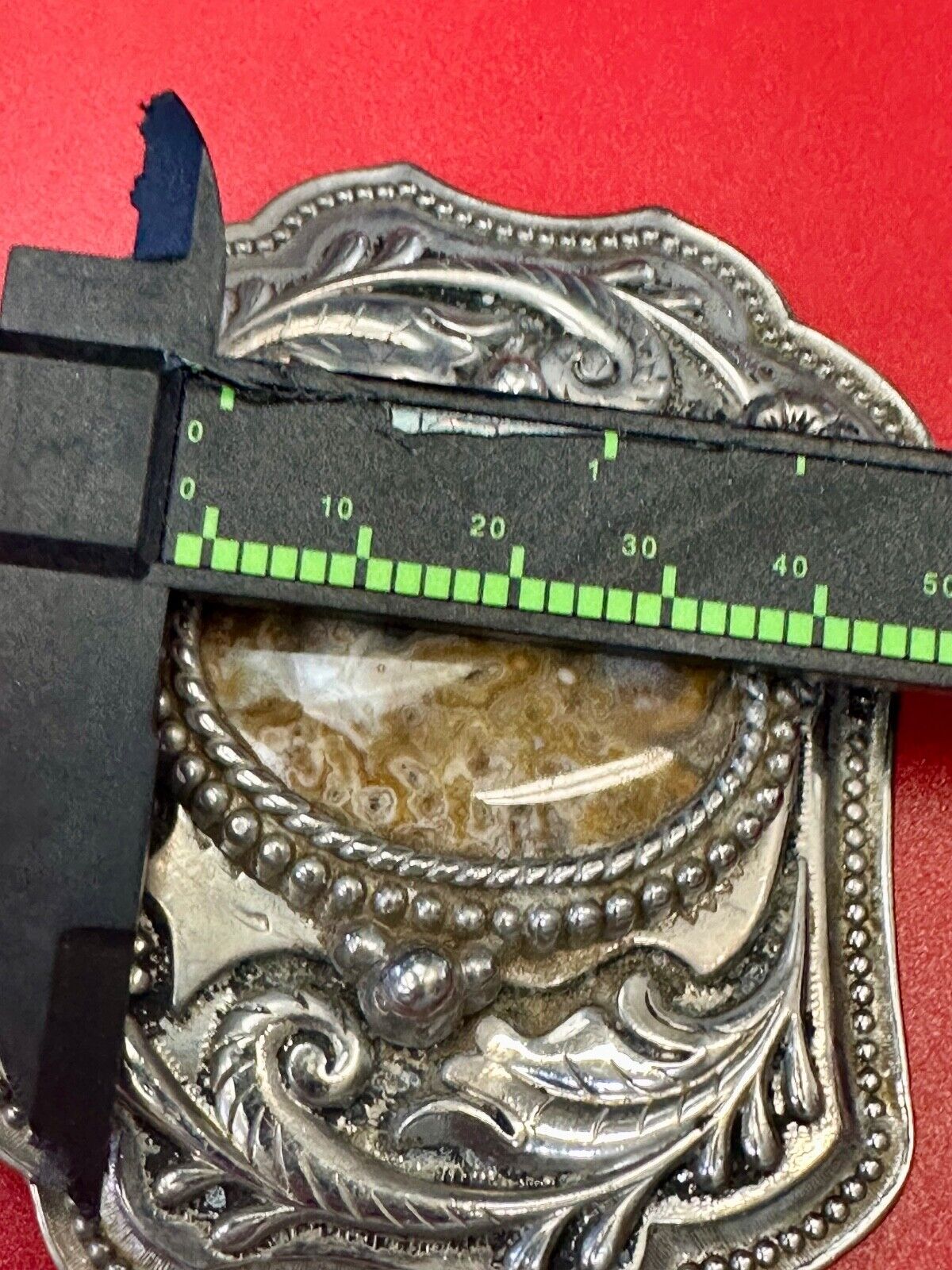 Vintage cabochon cab stone centerpiece on western silver tone belt buckle