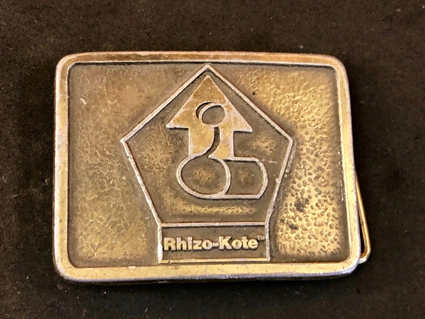 Vintage advertising Rhizo kote seal coating company belt buckle