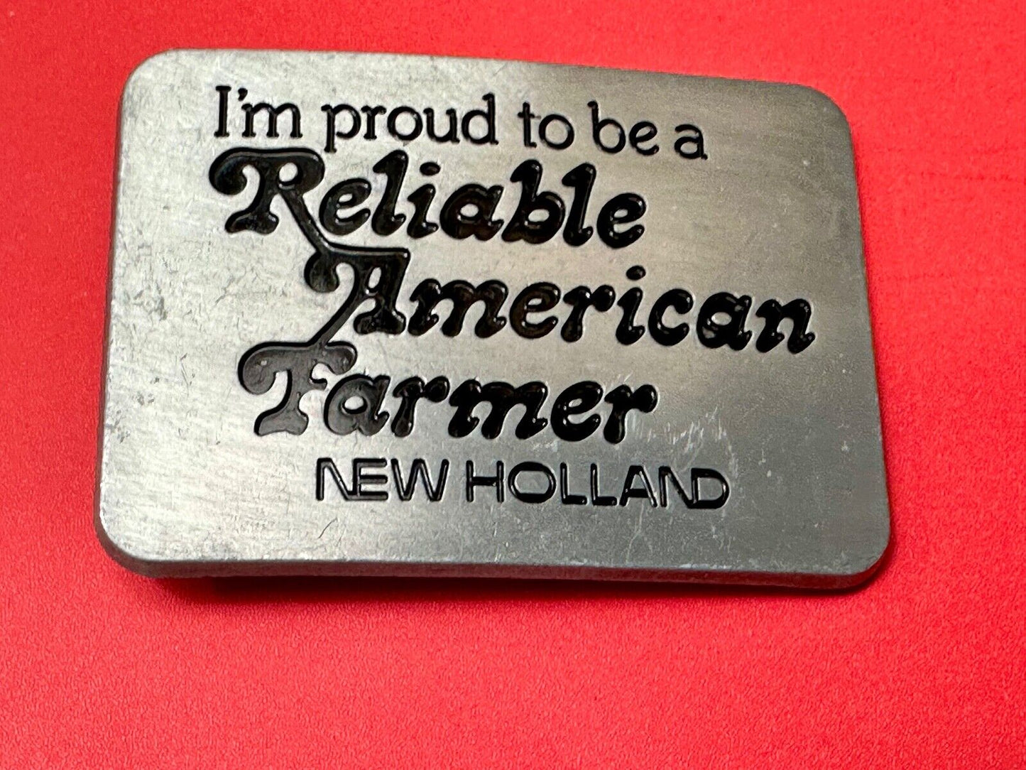 Vintage 1982 NEW HOLLAND I'm Proud to be a Reliable American Farmer Belt Buckle