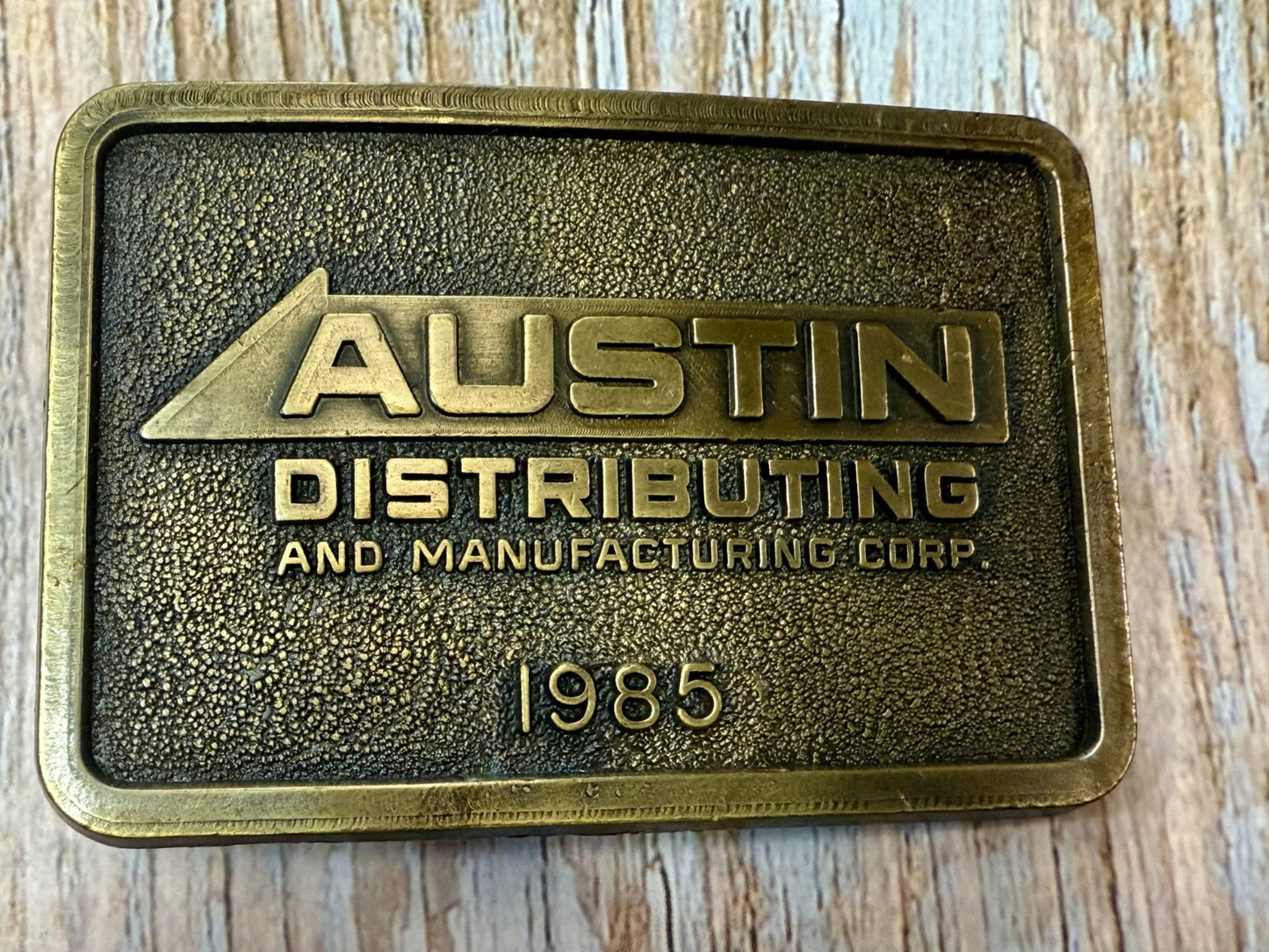Austin Texas Distributing and Manufacturing Corp 1985 NOS RJ Belt Buckle
