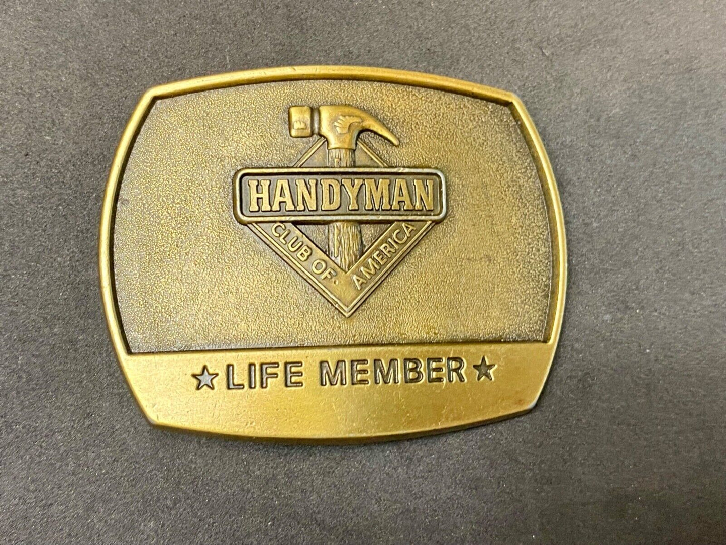 vintage handyman club of America Hammer Ruler- life member belt buckle