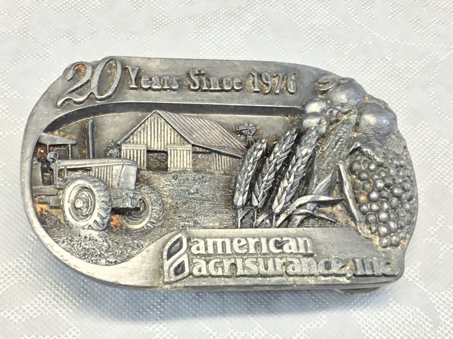 20 years since 1976 - American Agrisurance Inc. - belt buckle
