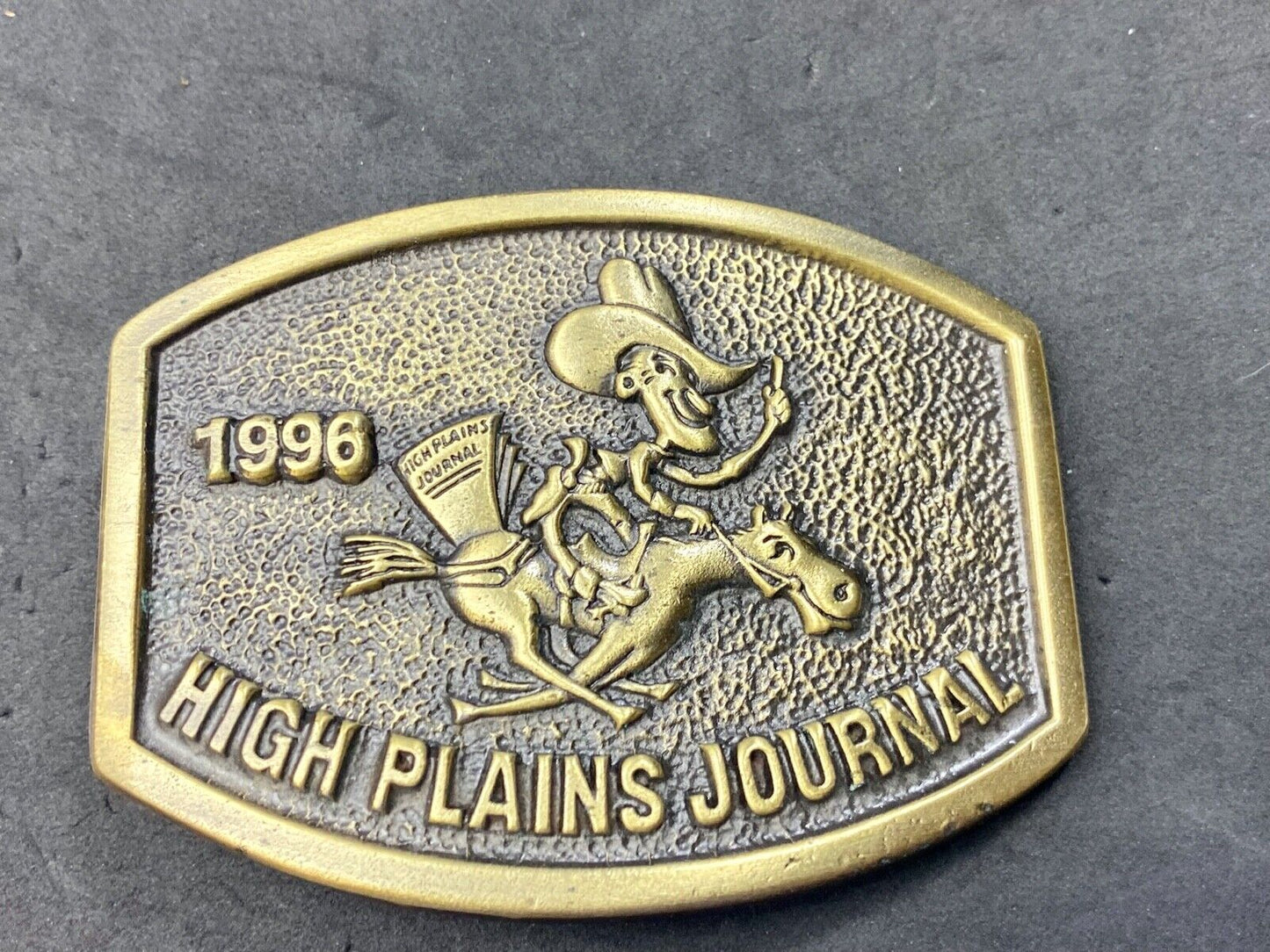 Vintage 1996 High Plains Journal Belt Buckle Cowboy Horse Newspaper