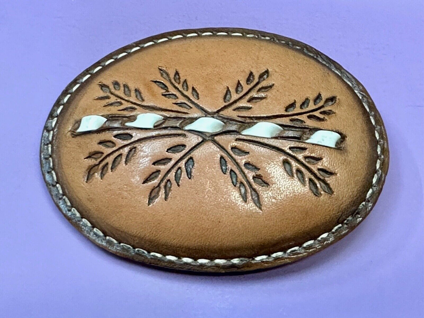 Beautiful Leather Factors Western oval mixed color / tooled Belt Buckle