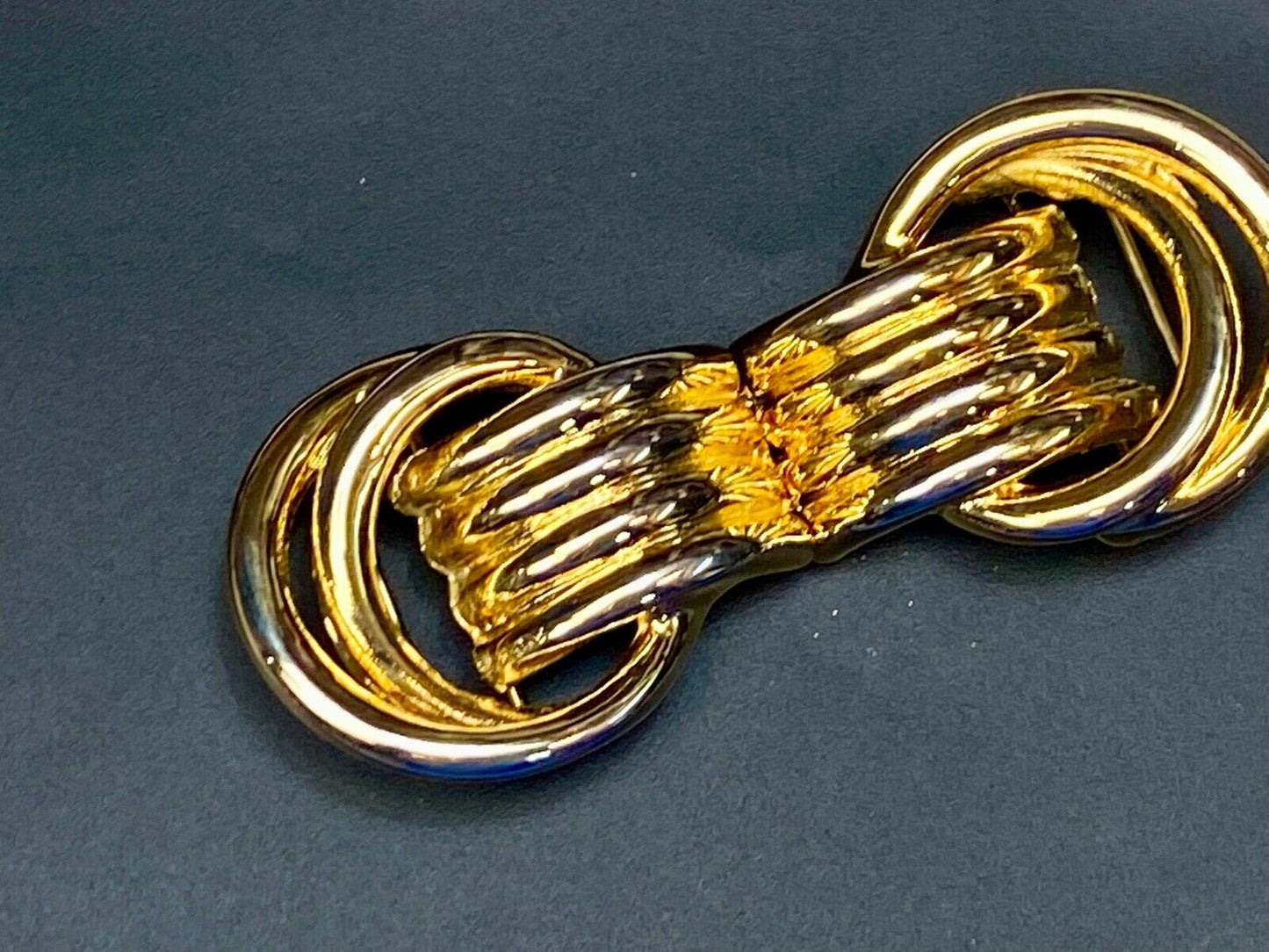 Vintage 2- piece interlocking dual knot ring pattern belt buckle by Dotty Smith