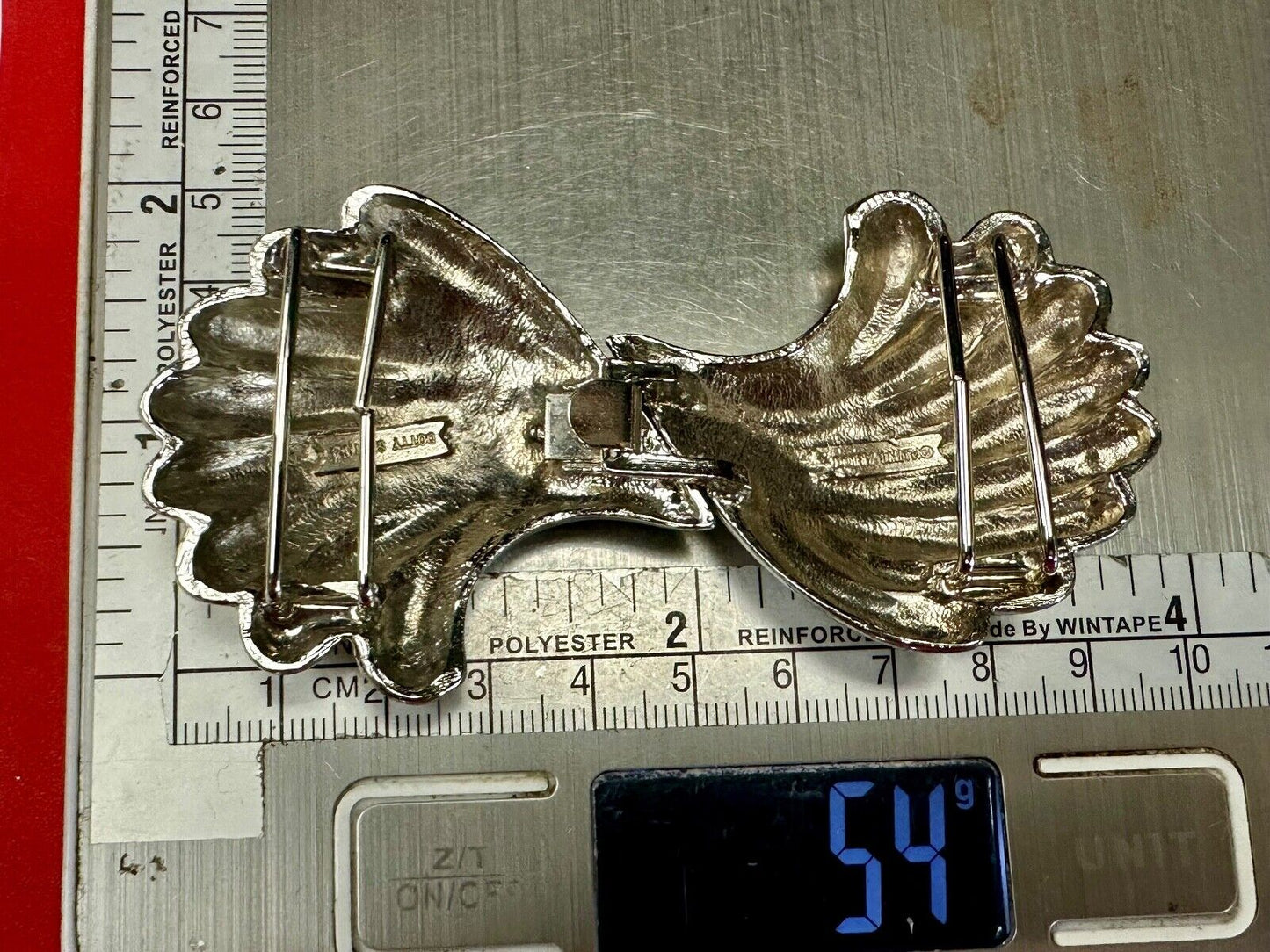 Two-piece interlocking gold color belt buckle by Dotty Smith