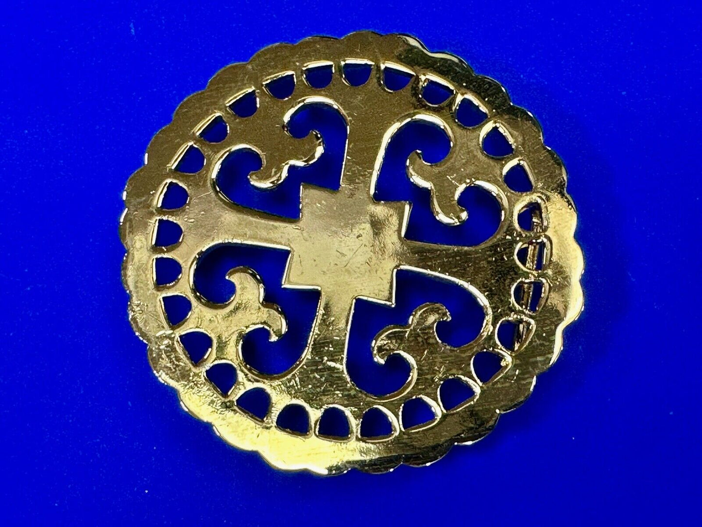 vintage Celtic pattern round cutout belt buckle by designer Ann Lansing