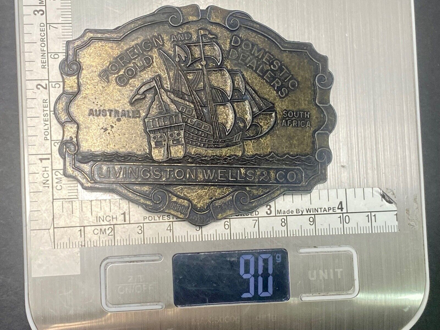 VINTAGE ANTIQUE METAL BELT BUCKLE- Livingston Wells & Co Sailboat Ship