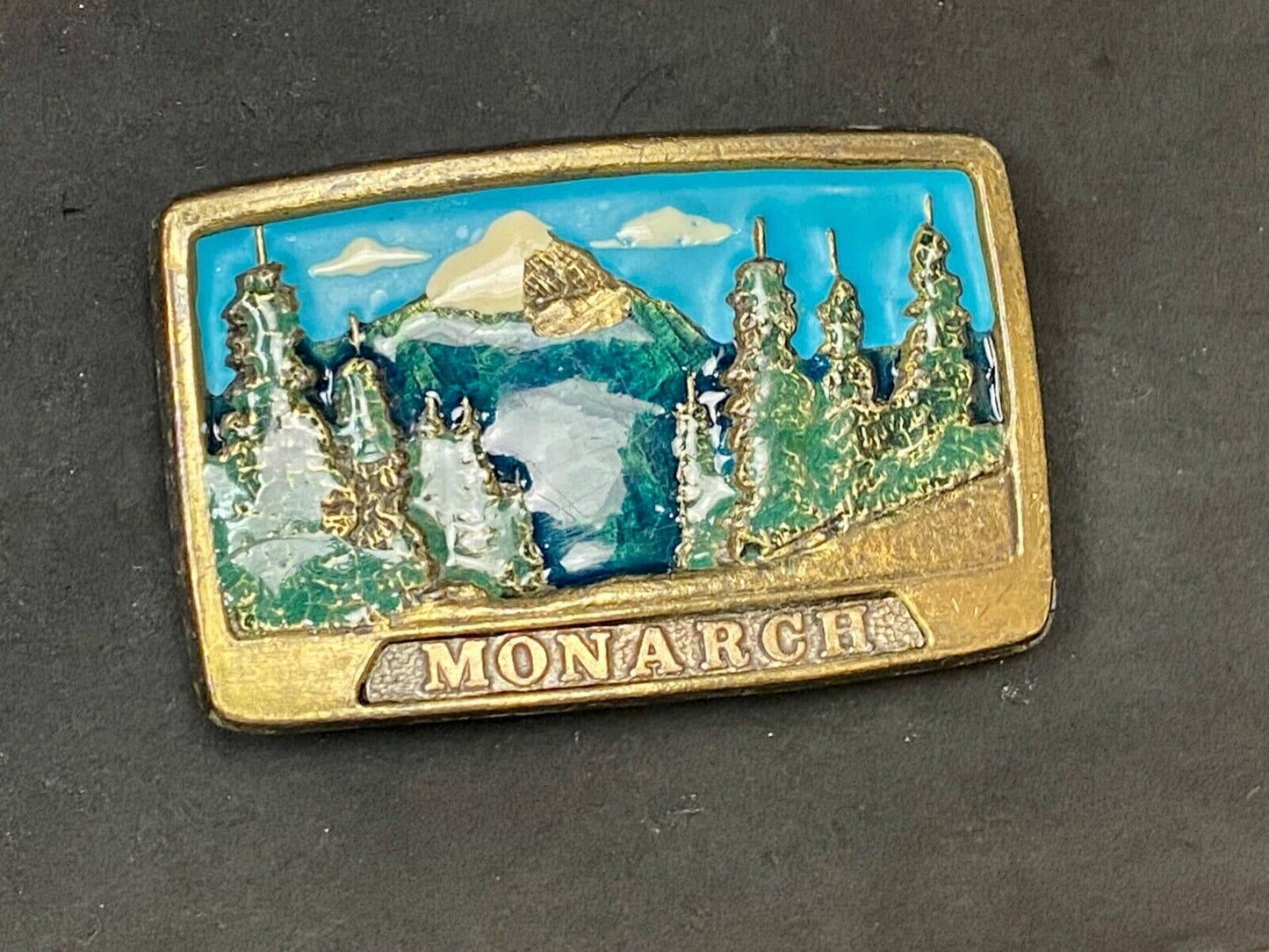 1981 Monarch Commemorative Belt Buckle Wyoming Imountain Clearing No 1003 A