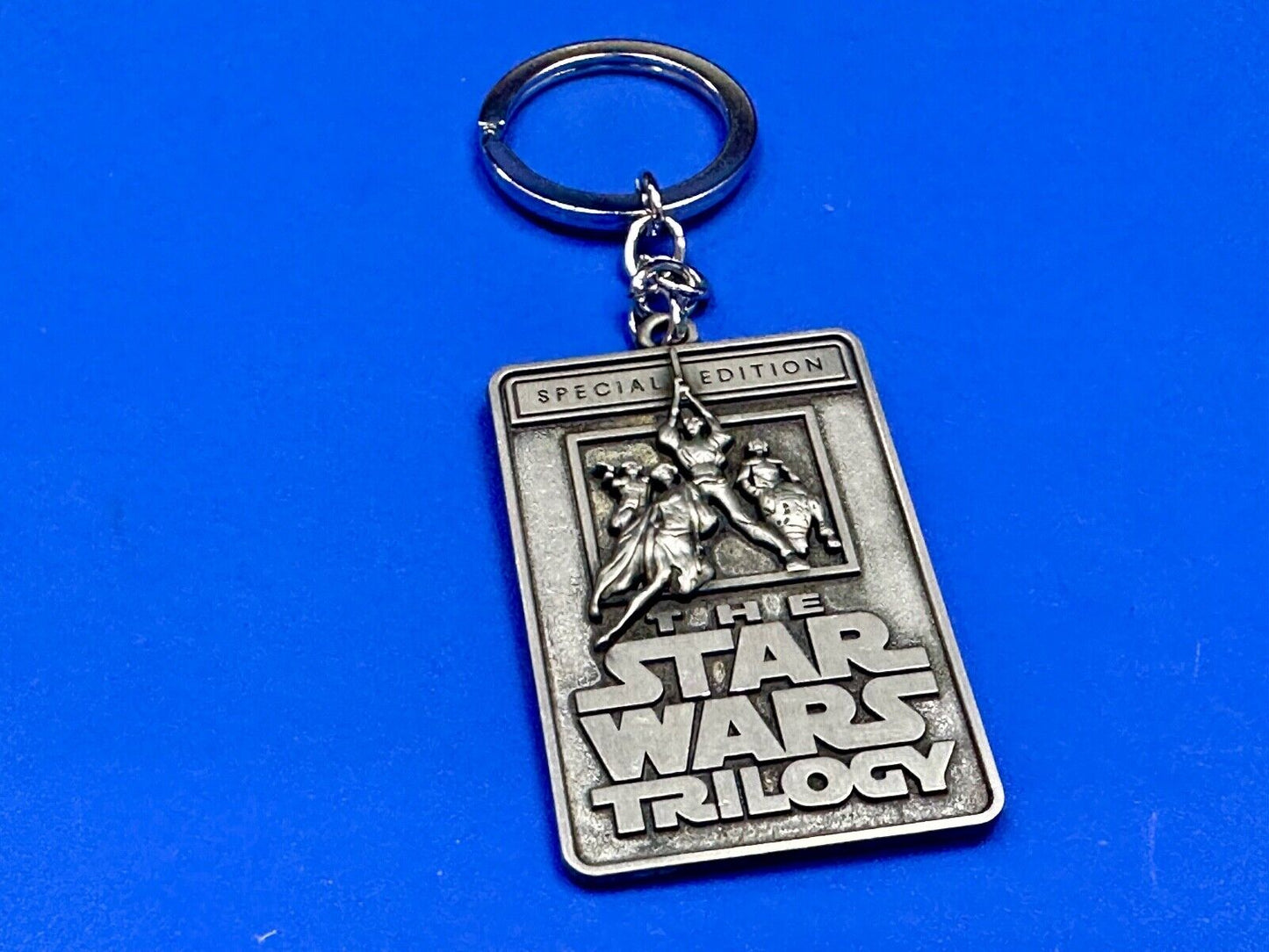 The Star Wars Trilogy Logo Emblem NOS Keychain!