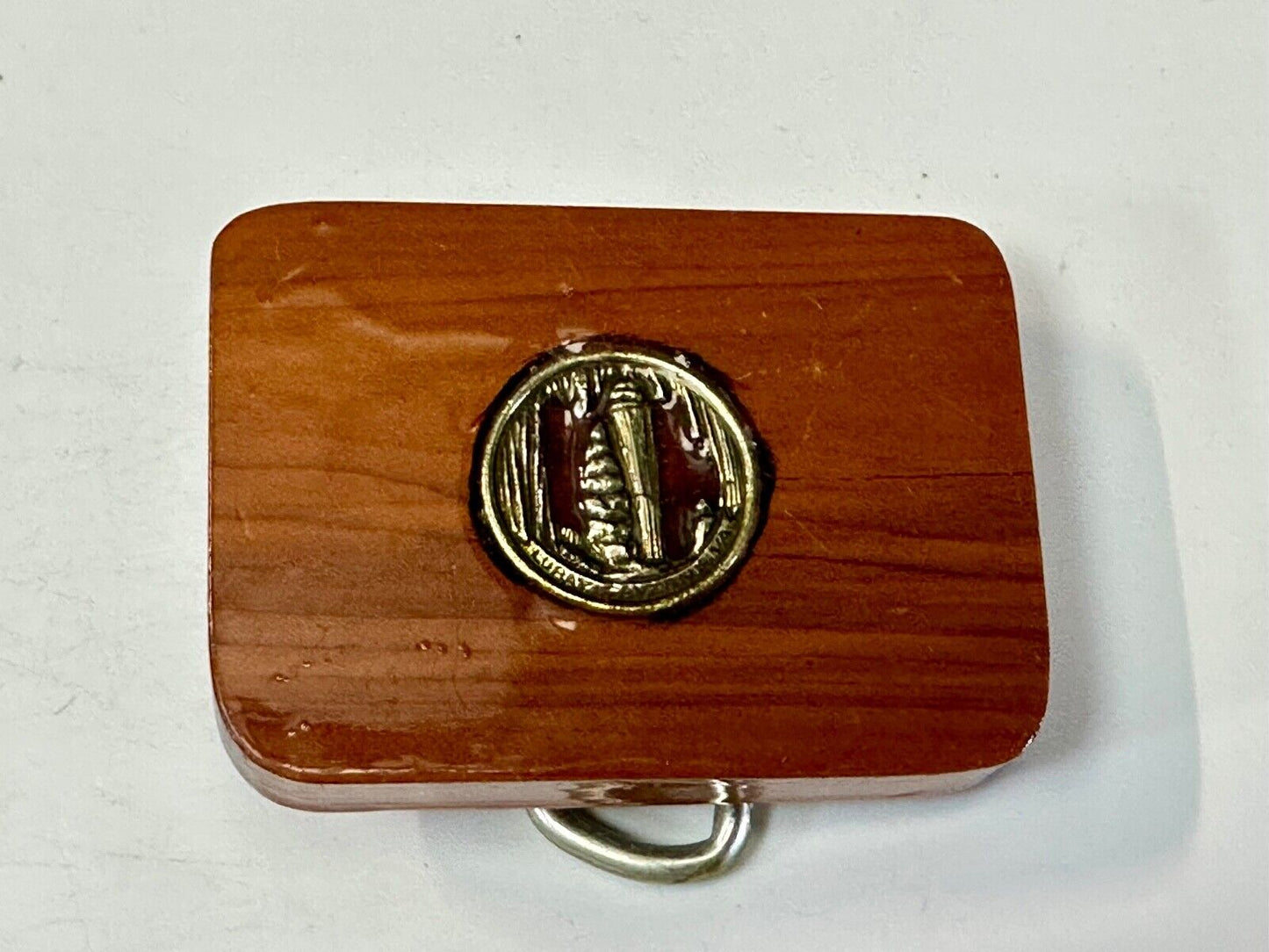 Artisan wood belt buckle with inlaid Luary Caverns cave token coin