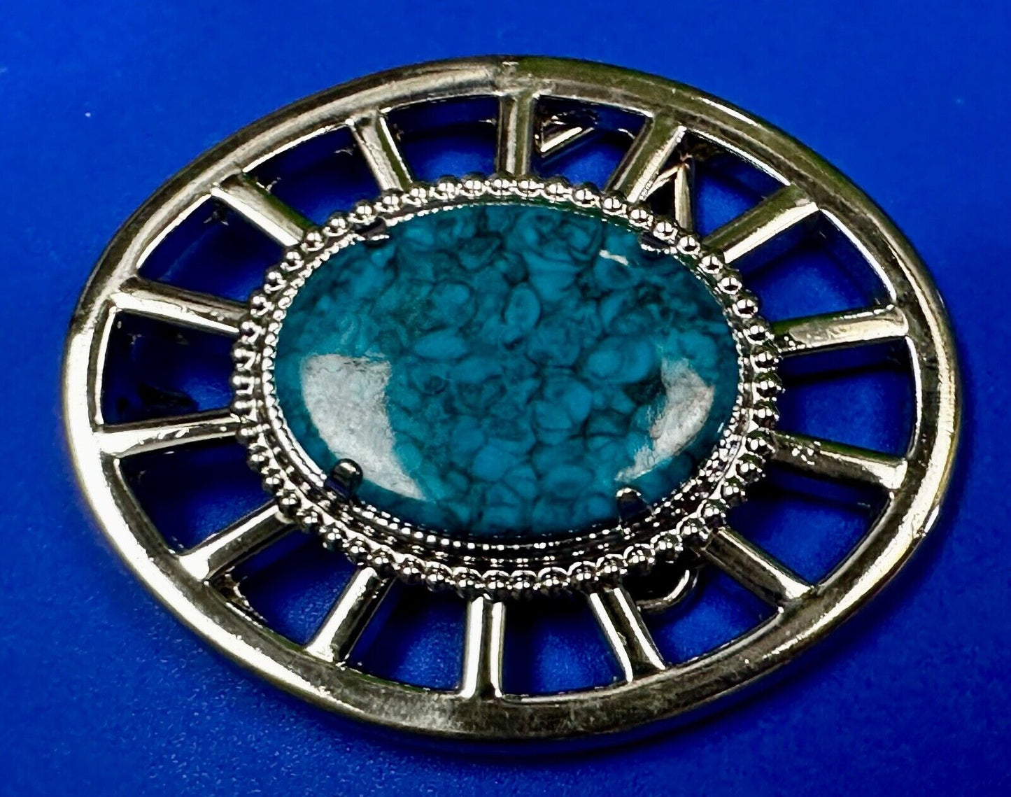 Synthetic Turquoise in unique see through silver tone round Belt Buckle