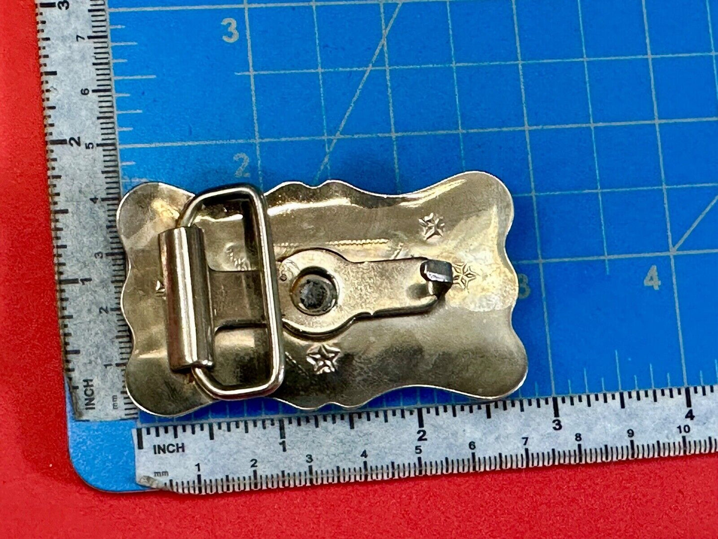 Vintage Cowboy Saddle Bronc western two tone belt buckle with star accents