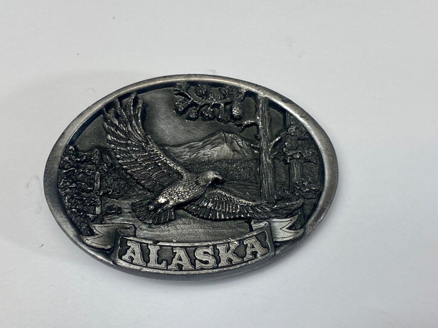 Vintage 1986 Eagle flying high over mountains Alaska belt buckle by C+-J
