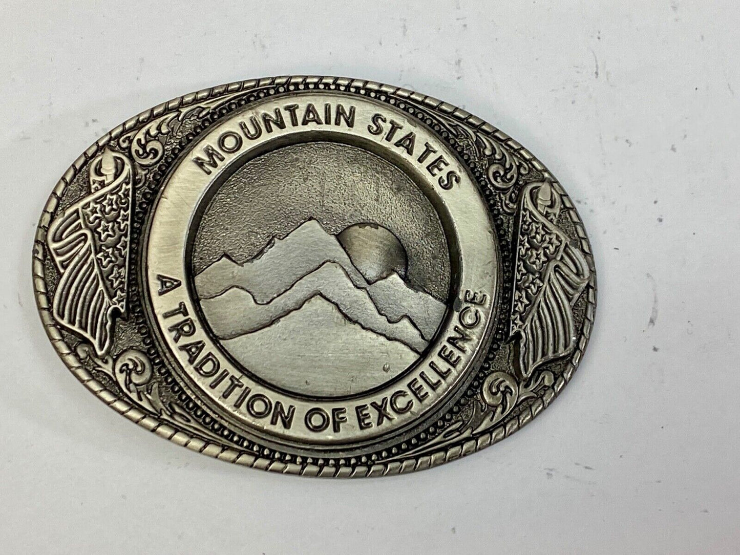 The Mountain States A Tradition Of Excellence Western Oval Belt Buckle