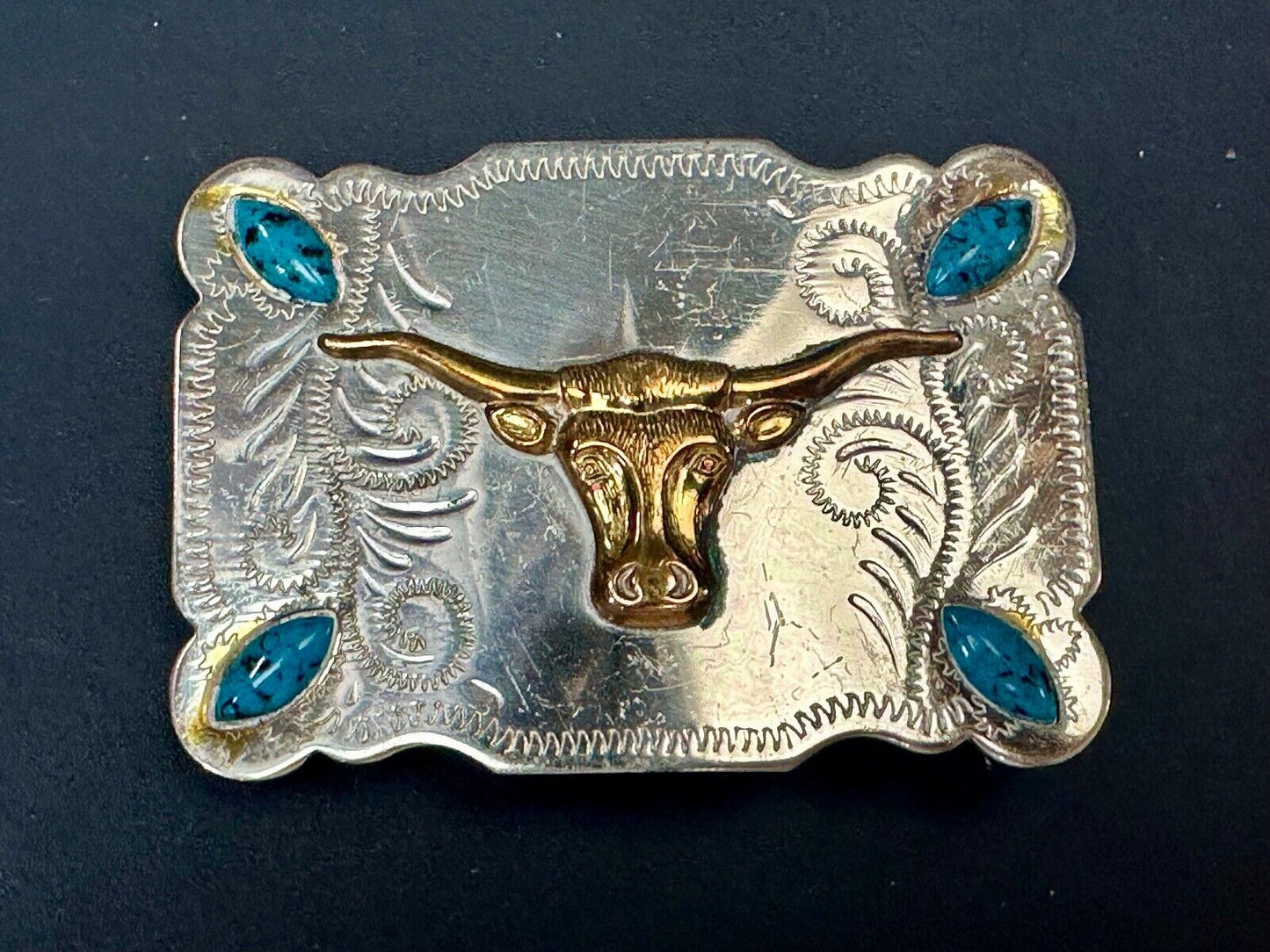 The Longhorn cow steer western nickel silver belt buckle with turquoise accents