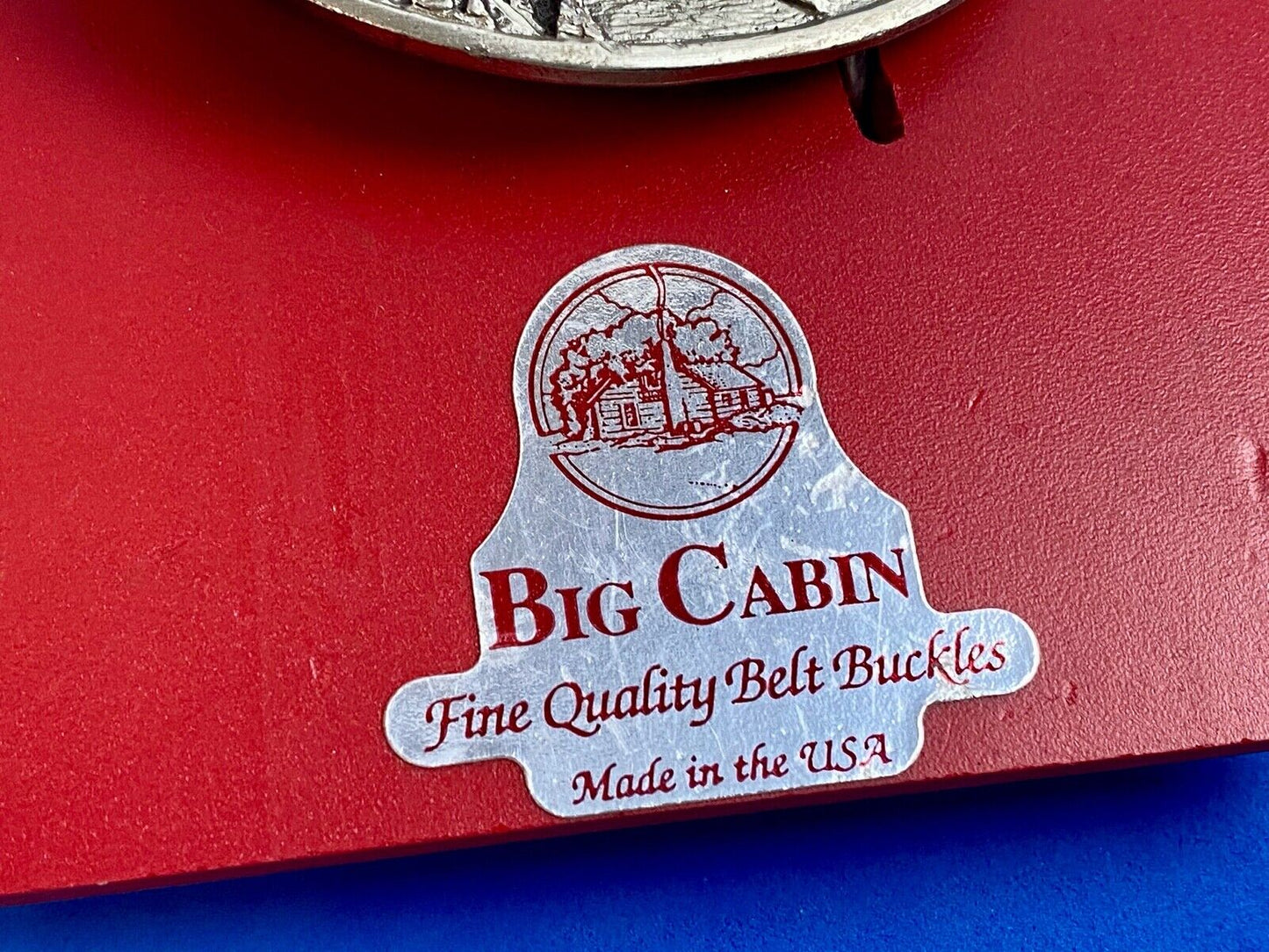 big cabin eagle head bust over mountains nature belt buckle on card