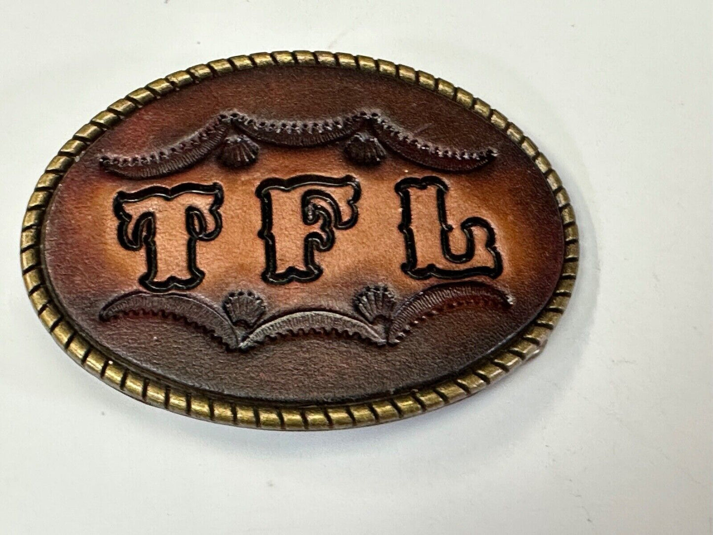 TFL. vintage western initials letters on leather belt buckle