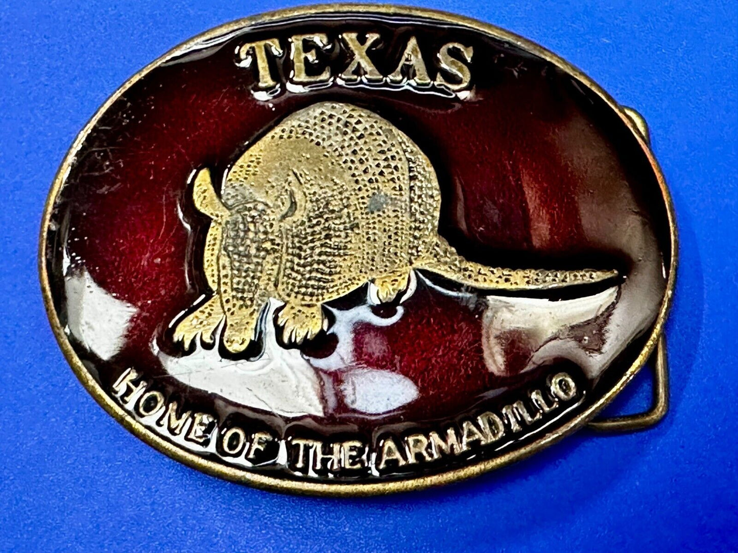 Texas Home of the Armadillo Commemorative Red colored Belt Buckle by Koleaco