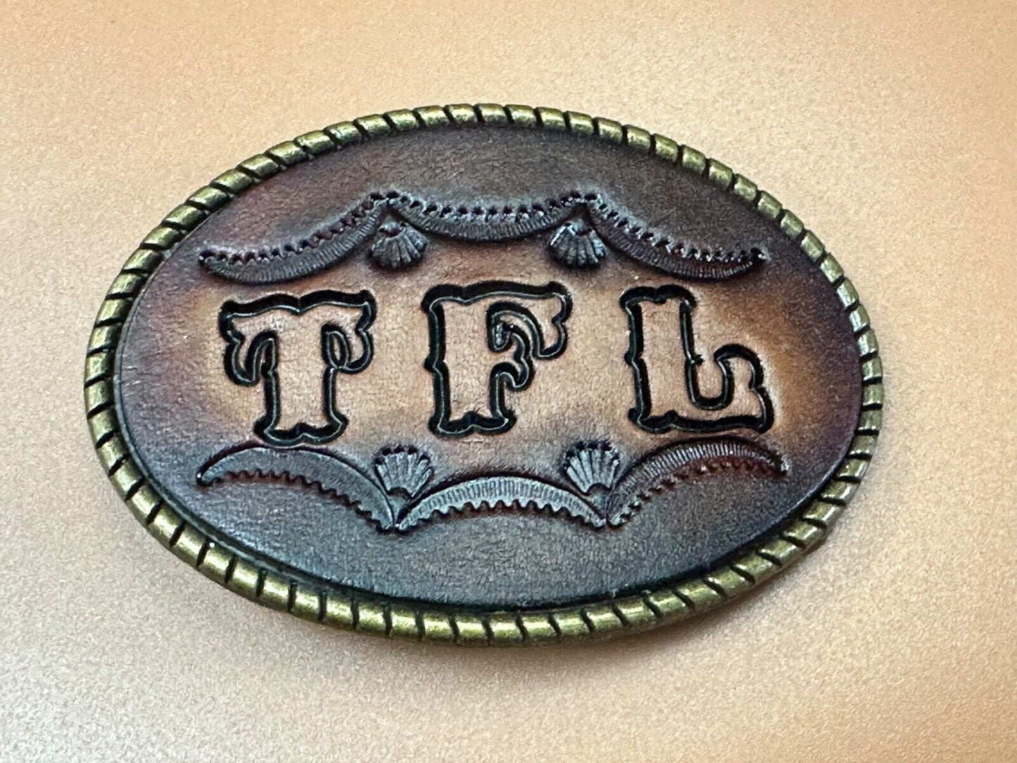 TFL. vintage western initials letters on leather belt buckle