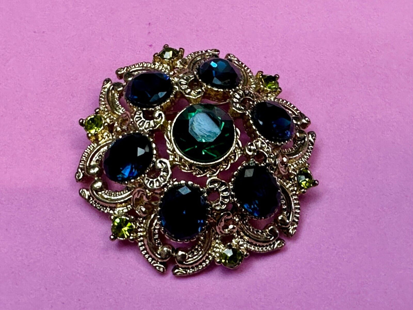 Beautiful Round Flower Shaped Blue Green Rhinestone Brooch Pin Signed by SQUIRE