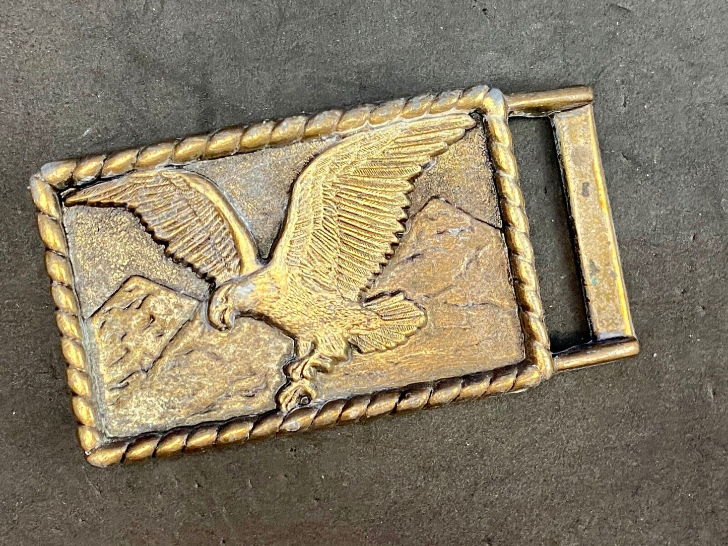 Vintage eagle flying over mountains belt buckle
