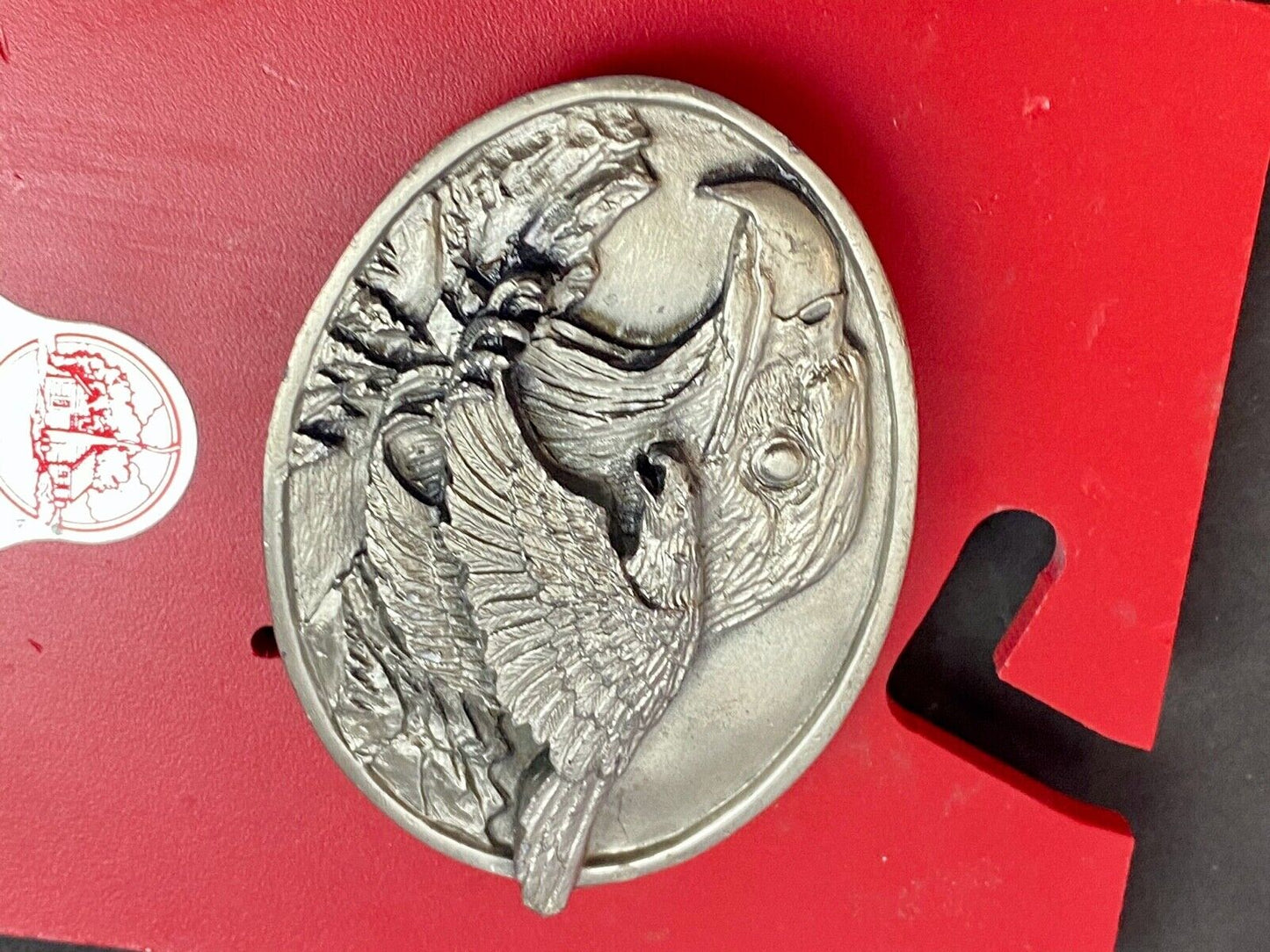 big cabin eagle head bust over mountains nature belt buckle on card